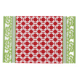 green and red paper placemats in a trellis pattern called "Monserrat" by Madcap Cottage in a white background