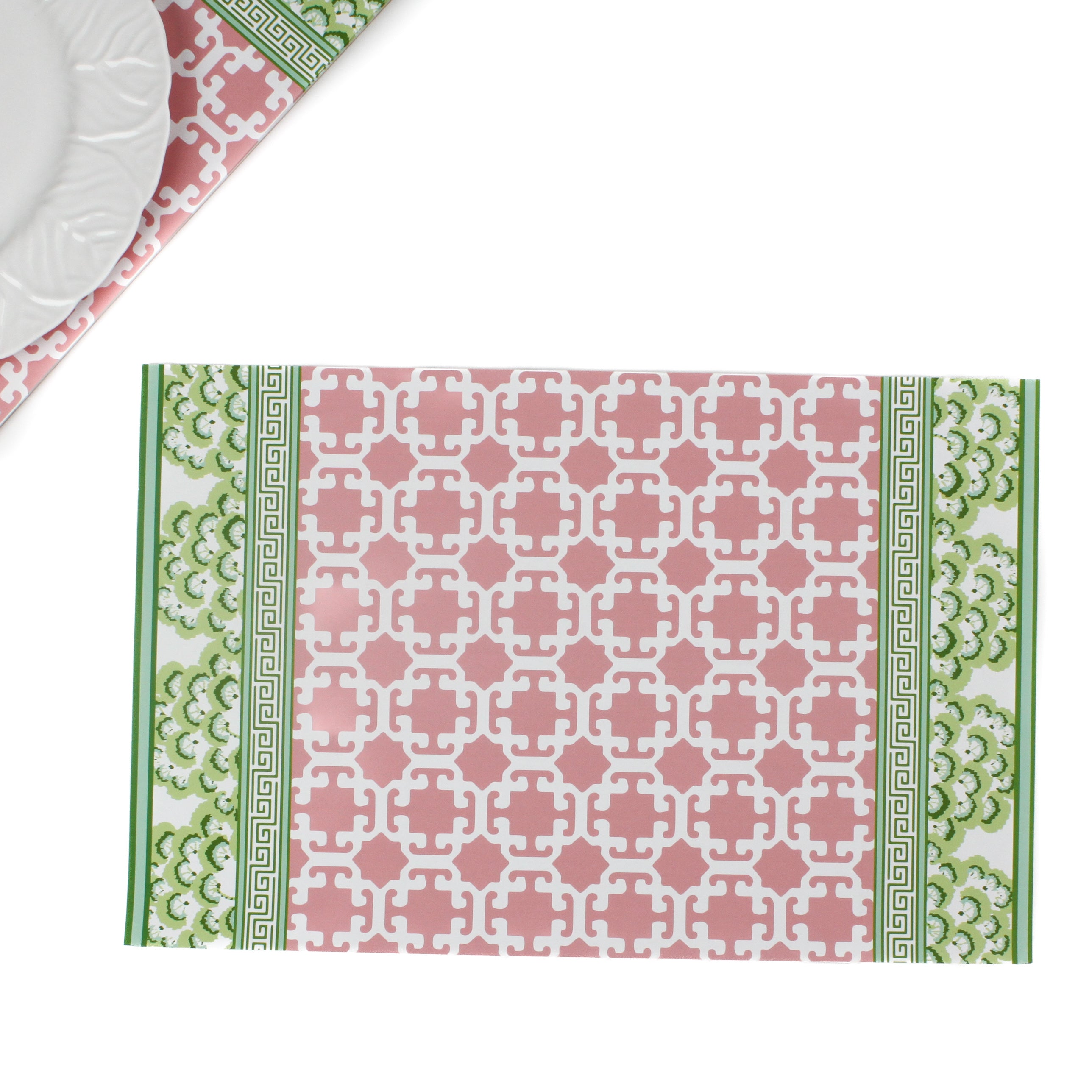 pink and green paper placemats in a trellis pattern called "Monserrat" by Madcap Cottage with white background