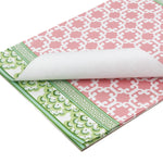 pink and green paper placemats in a trellis pattern called "Monserrat" by Madcap Cottage with white background.