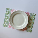 pink and green paper placemats in a trellis pattern called "Monserrat" by Madcap Cottage