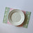 pink and green paper placemats in a trellis pattern called "Monserrat" by Madcap Cottage