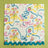 A Bunnies and bow print fabric easter napkins in multicolor against a light green background. 
