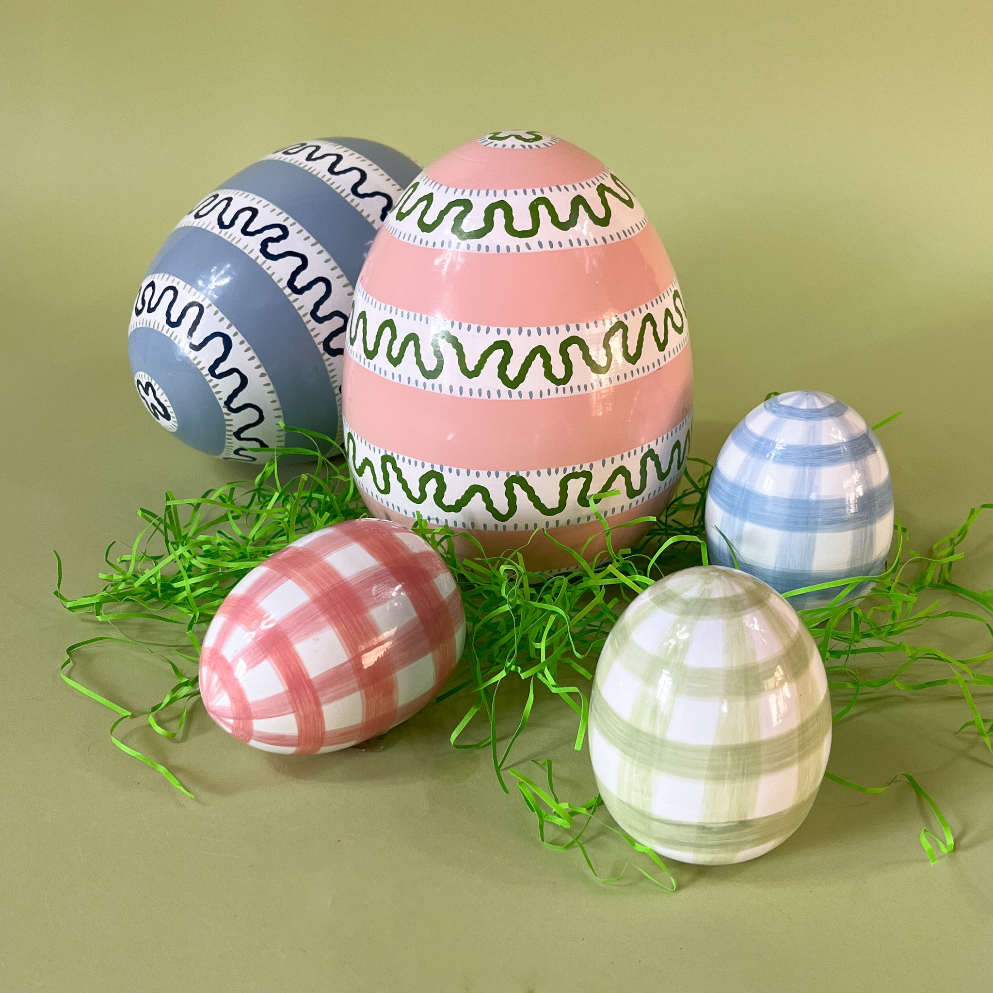 a set of four large decorative easter eggs