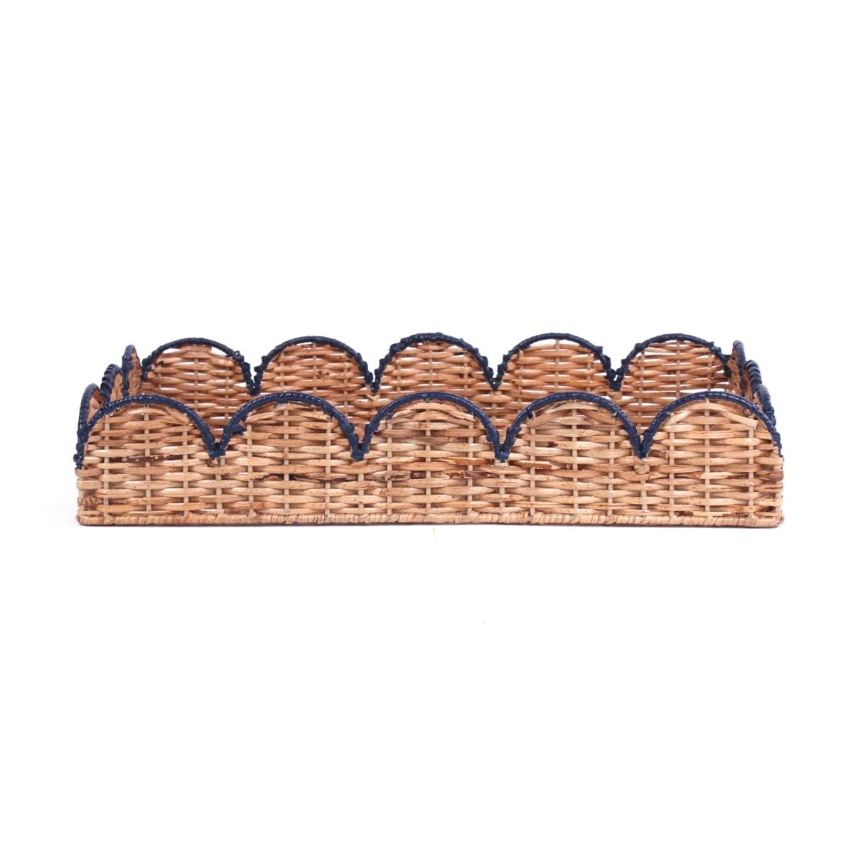 side view of scalloped rattan tray with navy trim