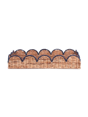 side view of scalloped rattan tray with navy trim
