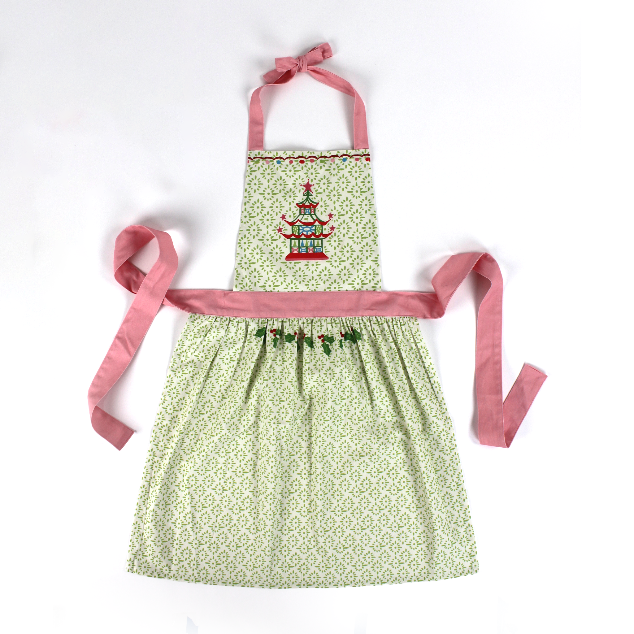 Madcap cottage apron with pagoda design and pink straps on a white background