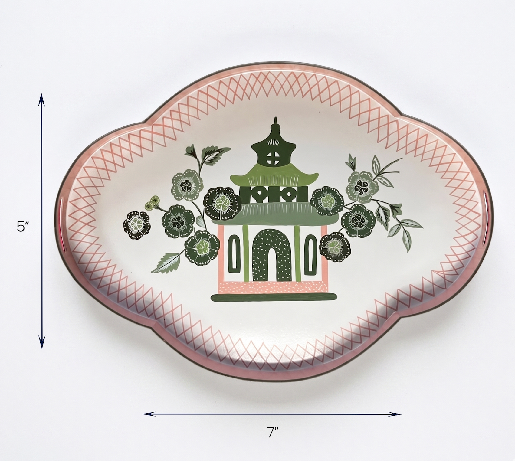 Decorative plate with floral and pagoda design, measurements indicated.