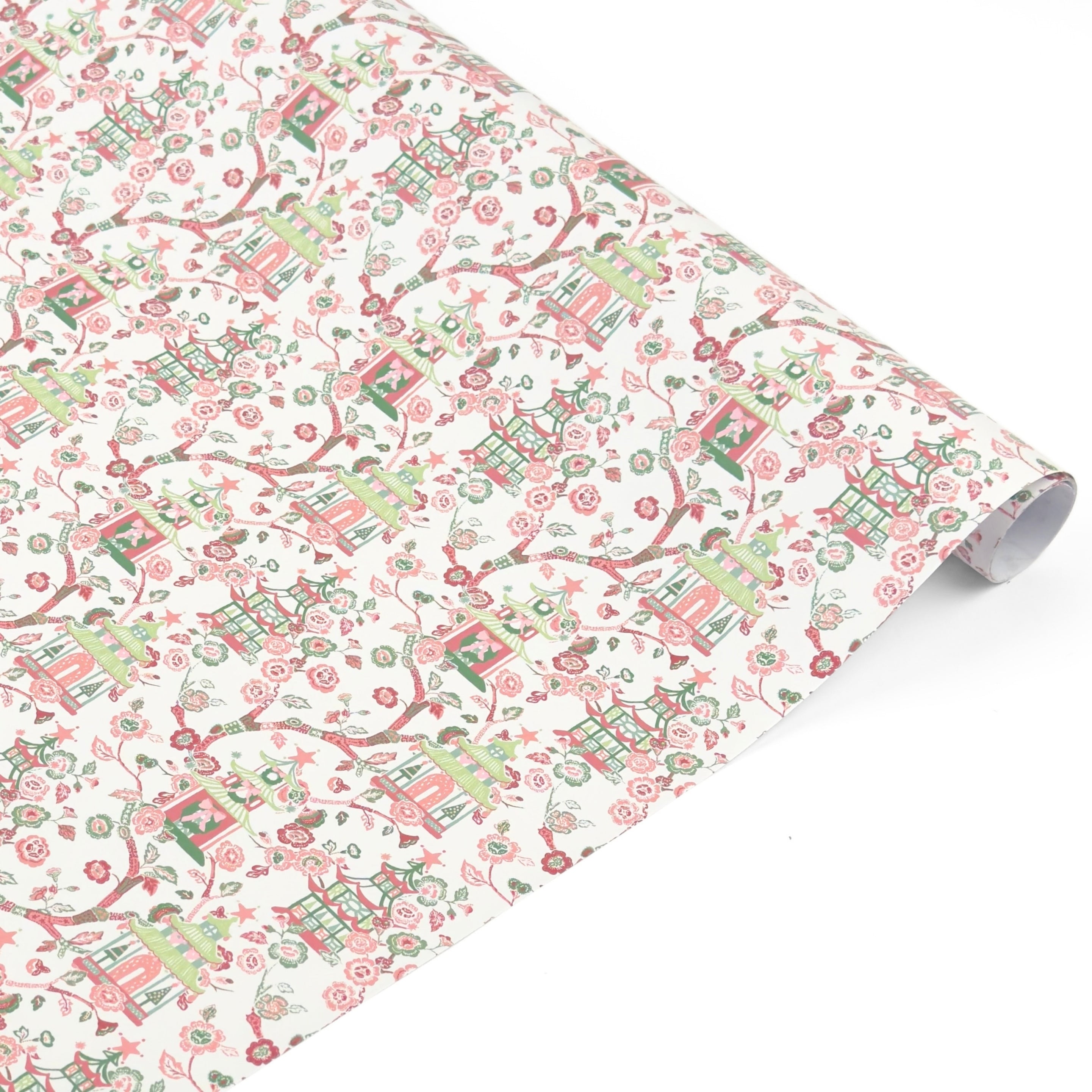Elegant chinoiserie gift wrap roll featuring whimsical pagodas, delicate pink florals, and charming botanical patterns.