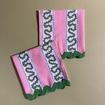Bahama pink dinner napkins in the pink striped harbor trail pattern fabric with green ric rac trim from madcap cottage