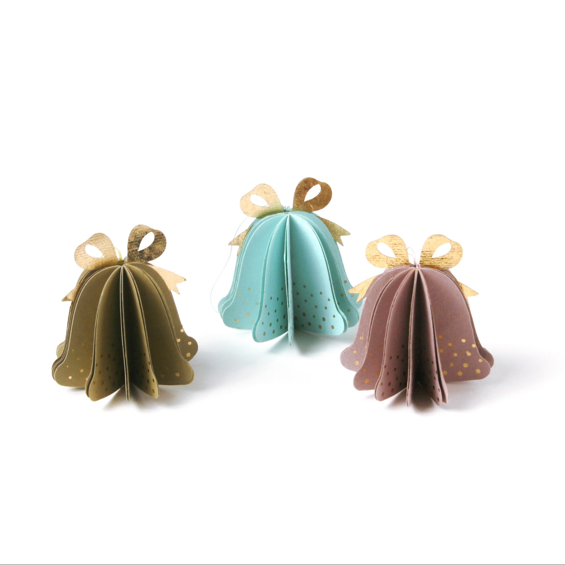 Set of pastel paper Christmas bell ornaments in blue, brown, and pink, featuring metallic gold bows and dotted details