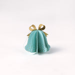 Single pastel paper Christmas bell ornaments in blue with metallic gold bows and dotted accents