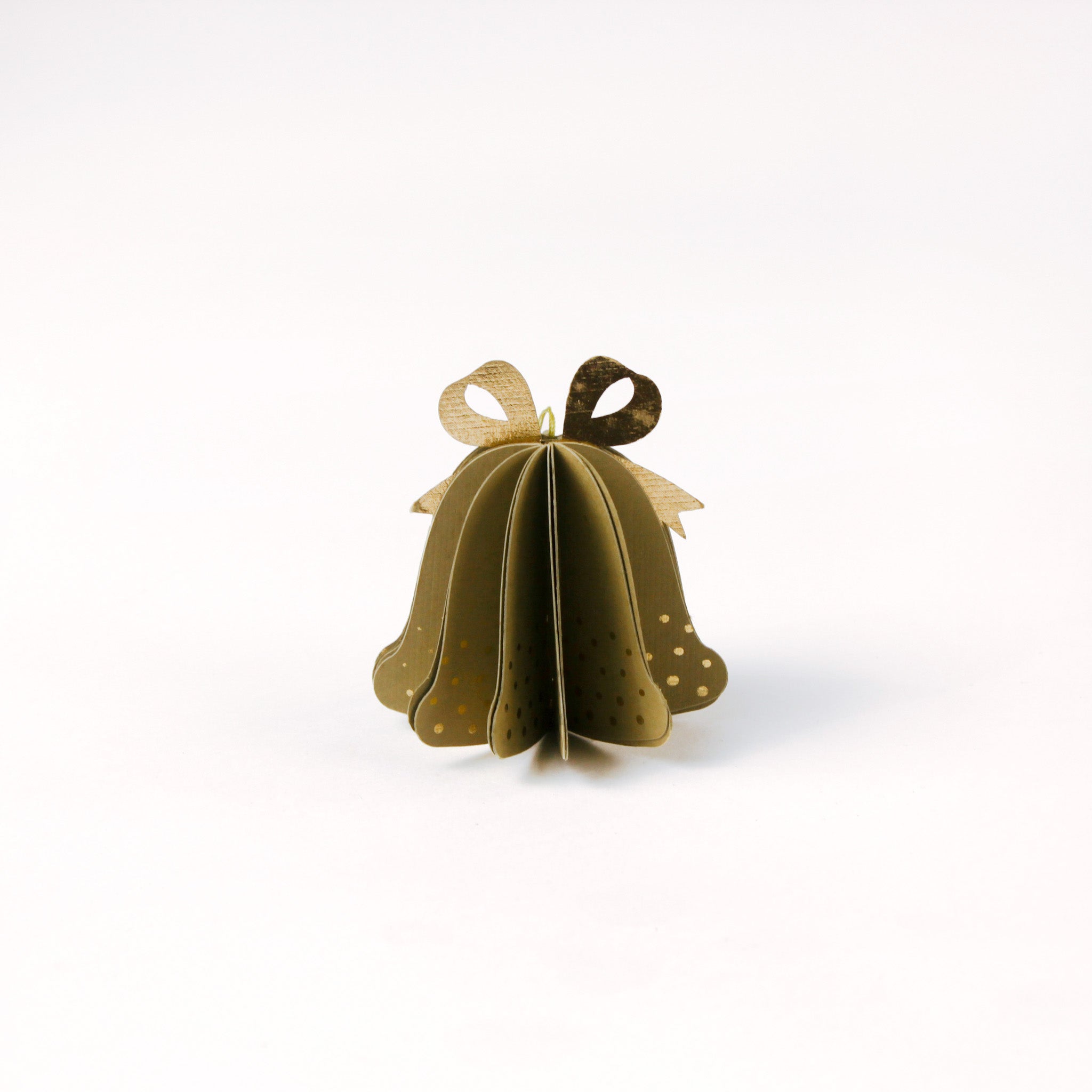 Single pastel paper Christmas bell ornaments in brown with metallic gold bows and dotted accents
