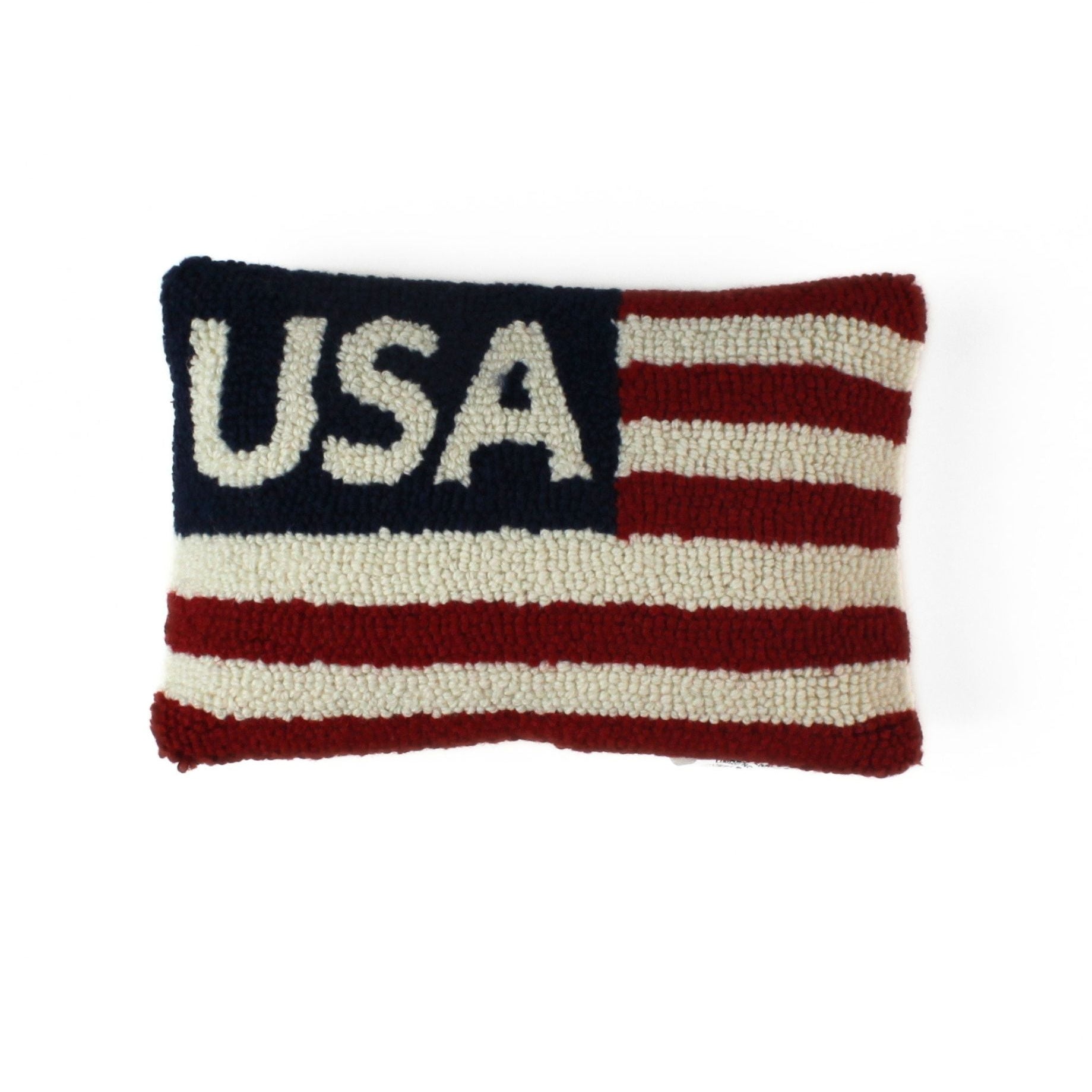 a patriotic USA pillow with red and white stripes and blue and white text that reads USA in the upper left corner on a white background