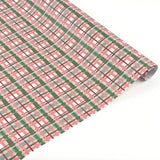 Charming gift wrap featuring peach, green, and pink plaid patterns, perfect for beautifully wrapped presents.