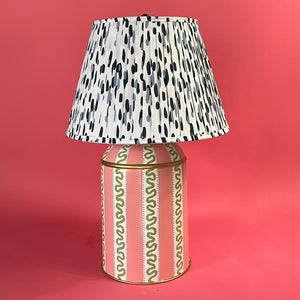 and pink and white striped lamp with a blue and white lampshade