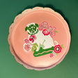 pink scalloped tray featuring a pug motif