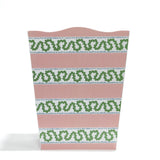 a pink and white striped wastepaper basket in the harbor trail pattern from madcap cottage