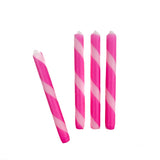 4 pcs of pink and white stripe candles on a white background