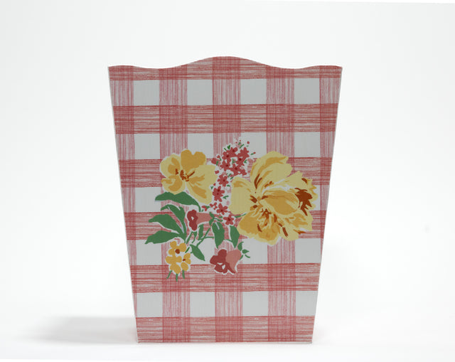 a green gingham wastepaper basket with a central floral motif from madcap cottage