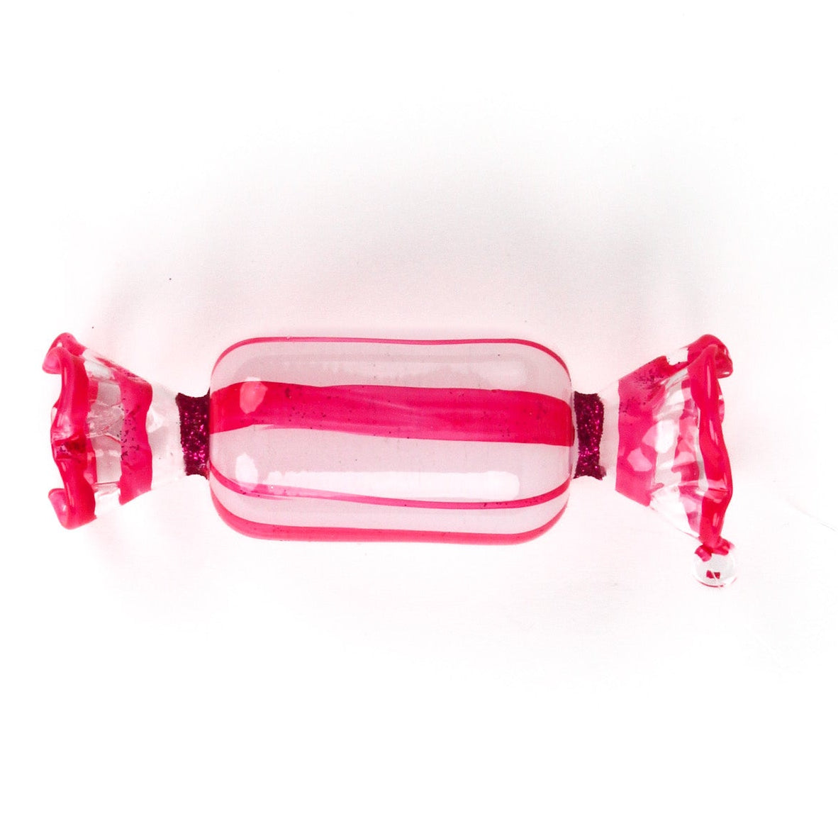 a pink glass candy ornament on a white background