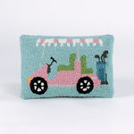 Rectangular decorative pillow with a design of a pink golf cart featuring green seats, a blue golf bag, and a pink-and-white canopy on a light blue background.