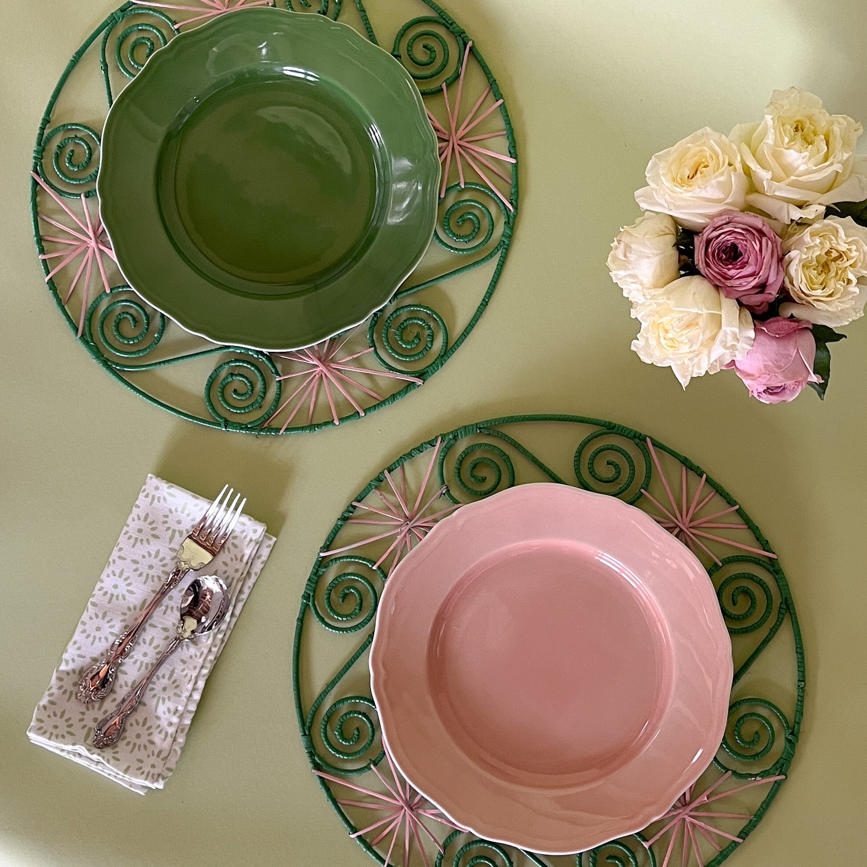 Pink/Green Hand-woven Round Rattan Placemats tabletop flatlay