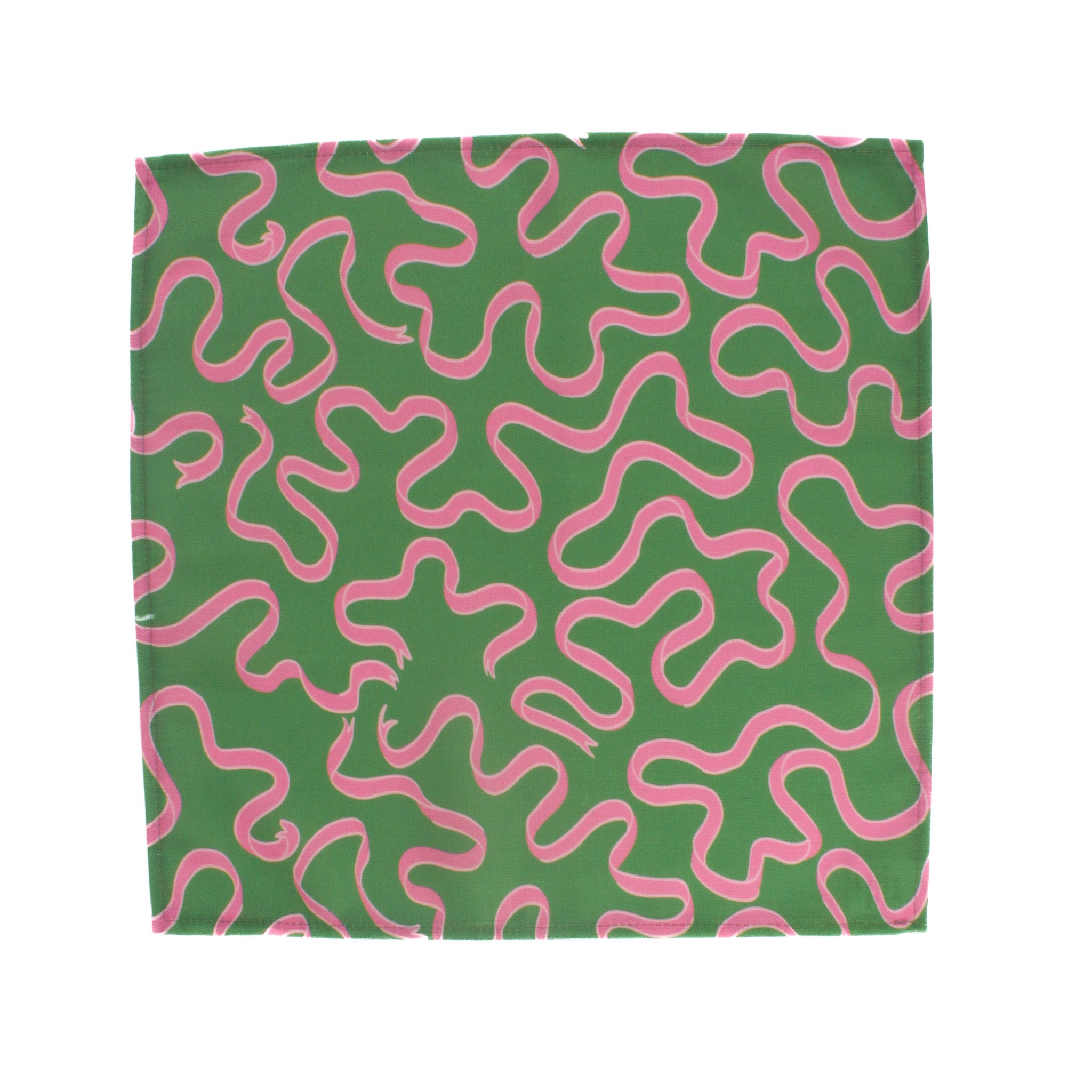 Green napkin with playful pink squiggle pattern on a white background, modern table linen perfect for Christmas tea towel styling, holiday entertaining, and seasonal home décor