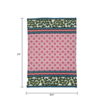 A pink and green chinoiserie tea towel featuring a central pink lattice pattern and green floral border against a white background with dimensions that read 24" x 18.5"