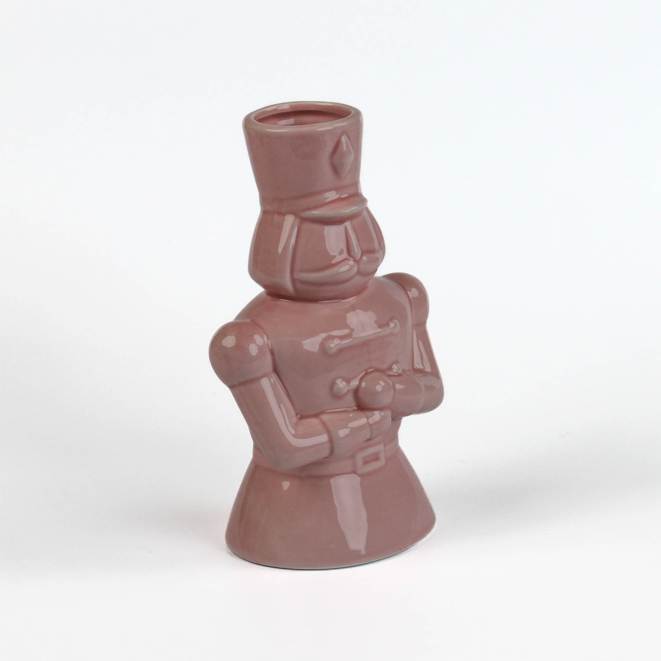 Pink ceramic nutcracker vase on a white background