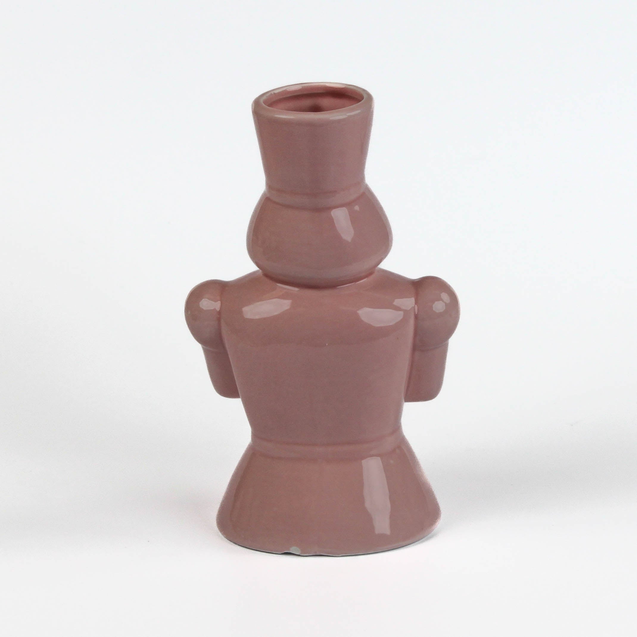back of a Pink ceramic nutcracker vase on a white background