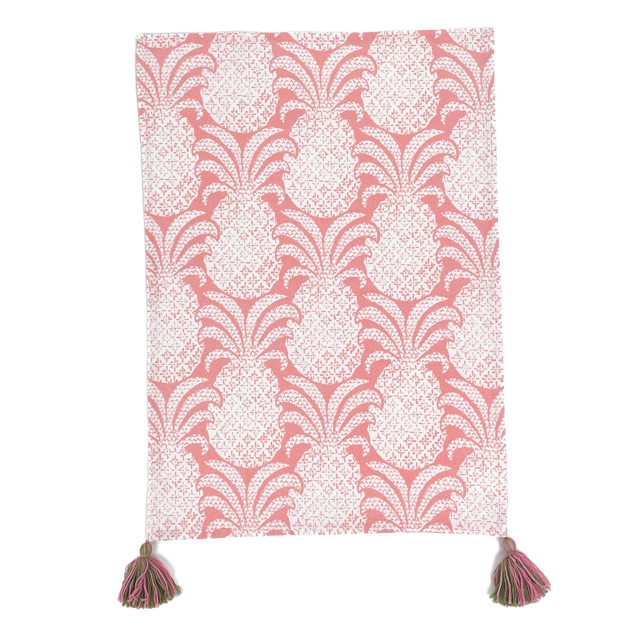 a white and pink pineapple tea towel with pink and green tassels against a white background. 