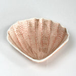 a pink ceramic shell plate from madcap cottage