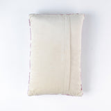 back of a Rectangular decorative pillow with a pink and white lattice background featuring a green double topiary plant in a blue and white chinoiserie-style pot.