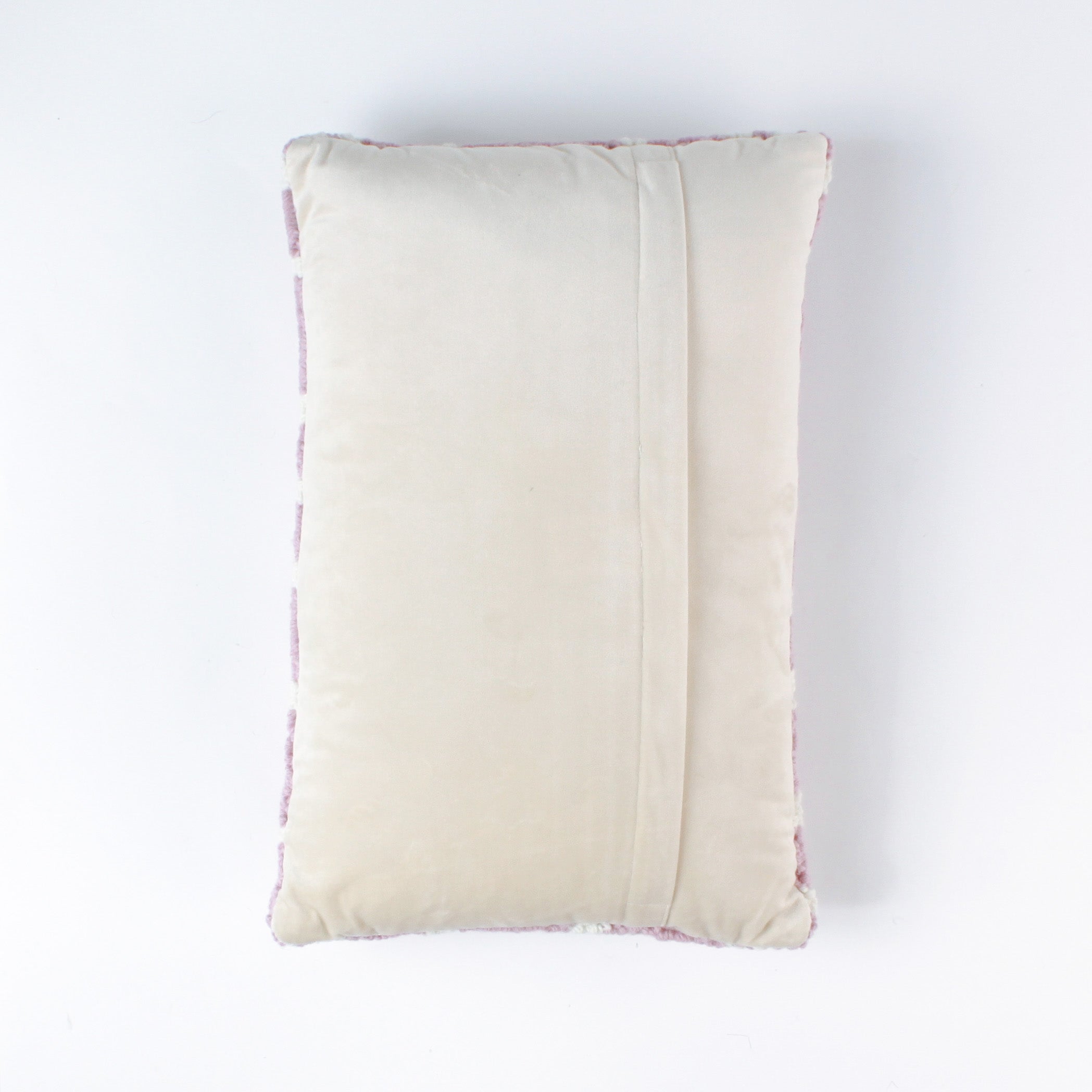 back of a Rectangular decorative pillow with a pink and white lattice background featuring a green double topiary plant in a blue and white chinoiserie-style pot.
