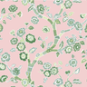 A green pink and white chinoiserie fabric sample featuring green cherry blossom motifs on a pink background. 