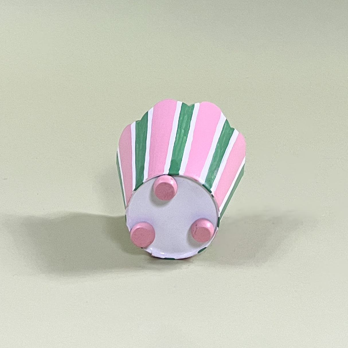 pink and green striped tole metal cachepot bottom