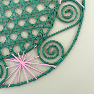 Pink/Green Hand-woven Round Rattan Placemats detail up close