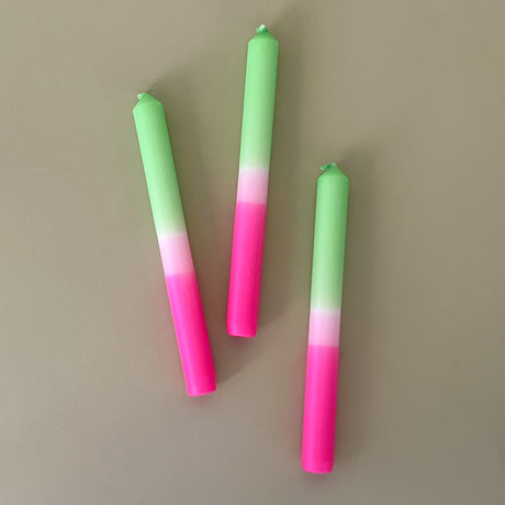 three pink and green spring taper candles 