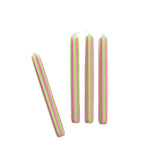 Green and pink pinstripe taper candles set with colorful vertical stripes for spring table decor.