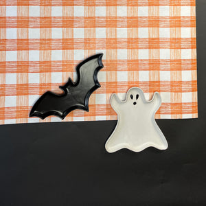 a gingham orange paper table runner in a pattern called gin lane by madcap cottage