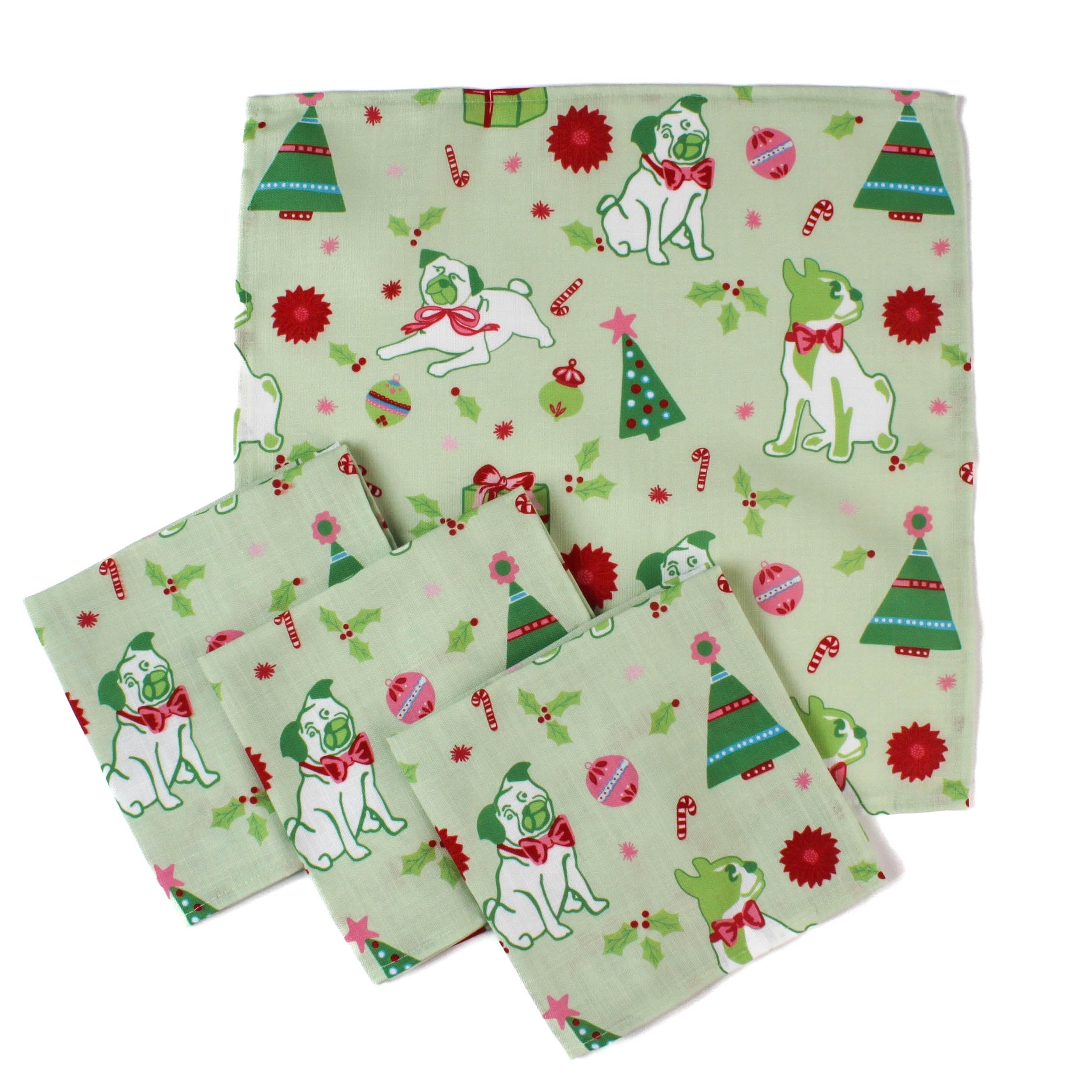 Set of green christmas napkins with pugs, christmas trees and candy cane motift on a white background