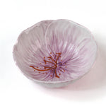 purple flower shaped bowl on a white background