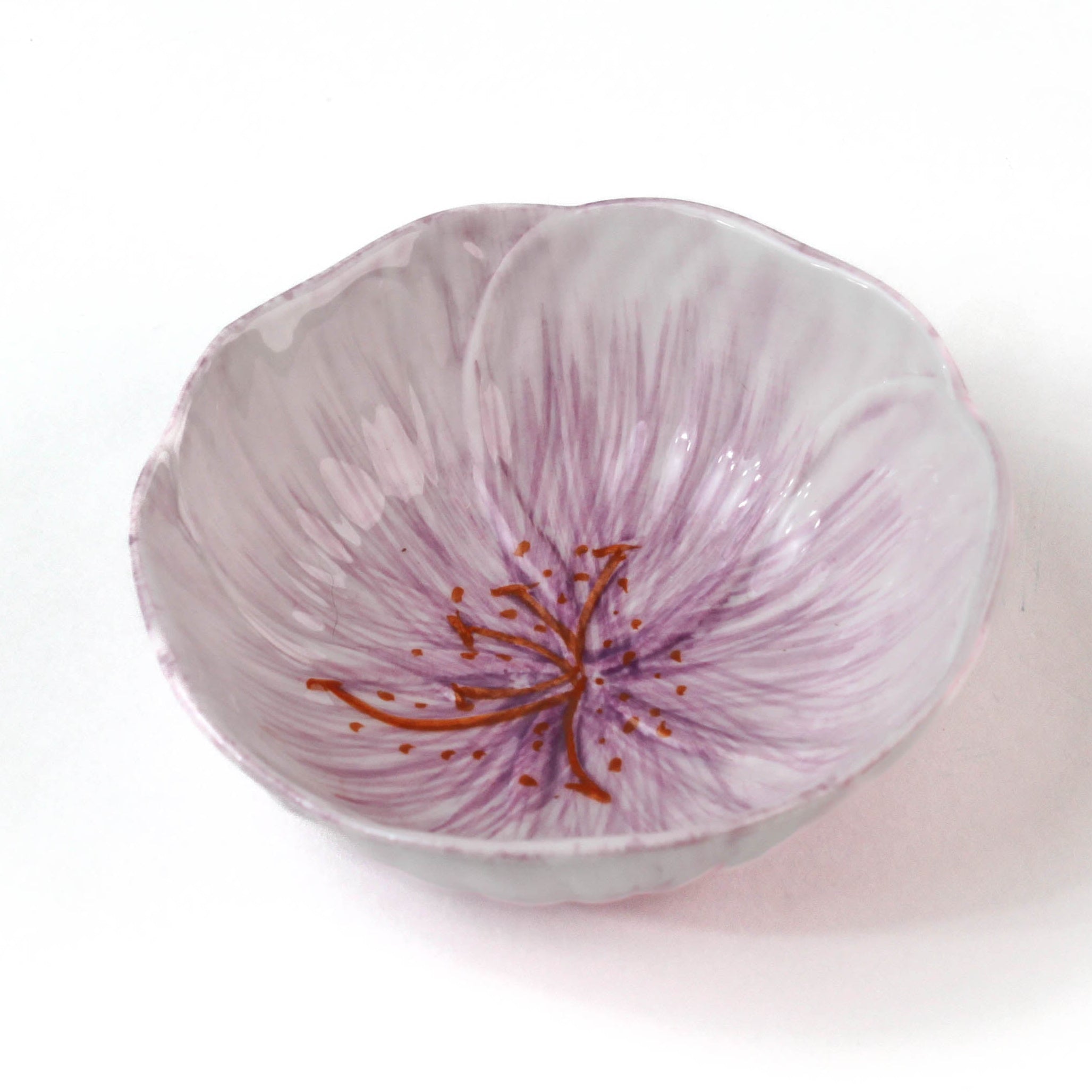 purple flower shaped bowl on a white background