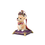 corgi christmas ornament with a crown and Union Jack bow tie on a purple cushion.