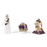 an queen elizabeth ornament, a purple crown ornament and a corgi ornament photographed on a white background.