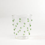 three-dimensional drinking glasses with green colored raised dots