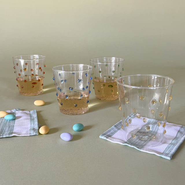 three-dimensional drinking glasses with colored raised dots 