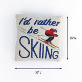 Square pillow with a skier graphic and the words I'd rather be skiing shown with 16 inch length and 16 inch width.