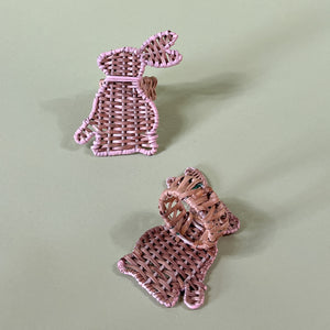 rattan bunny napkin ring pair with one showing the ring detail