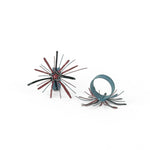 Pair of red Starburst patriotic napkin rings with festive red, white, and blue design.